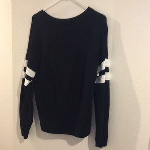 black long sleeve sweater w/ white stripes